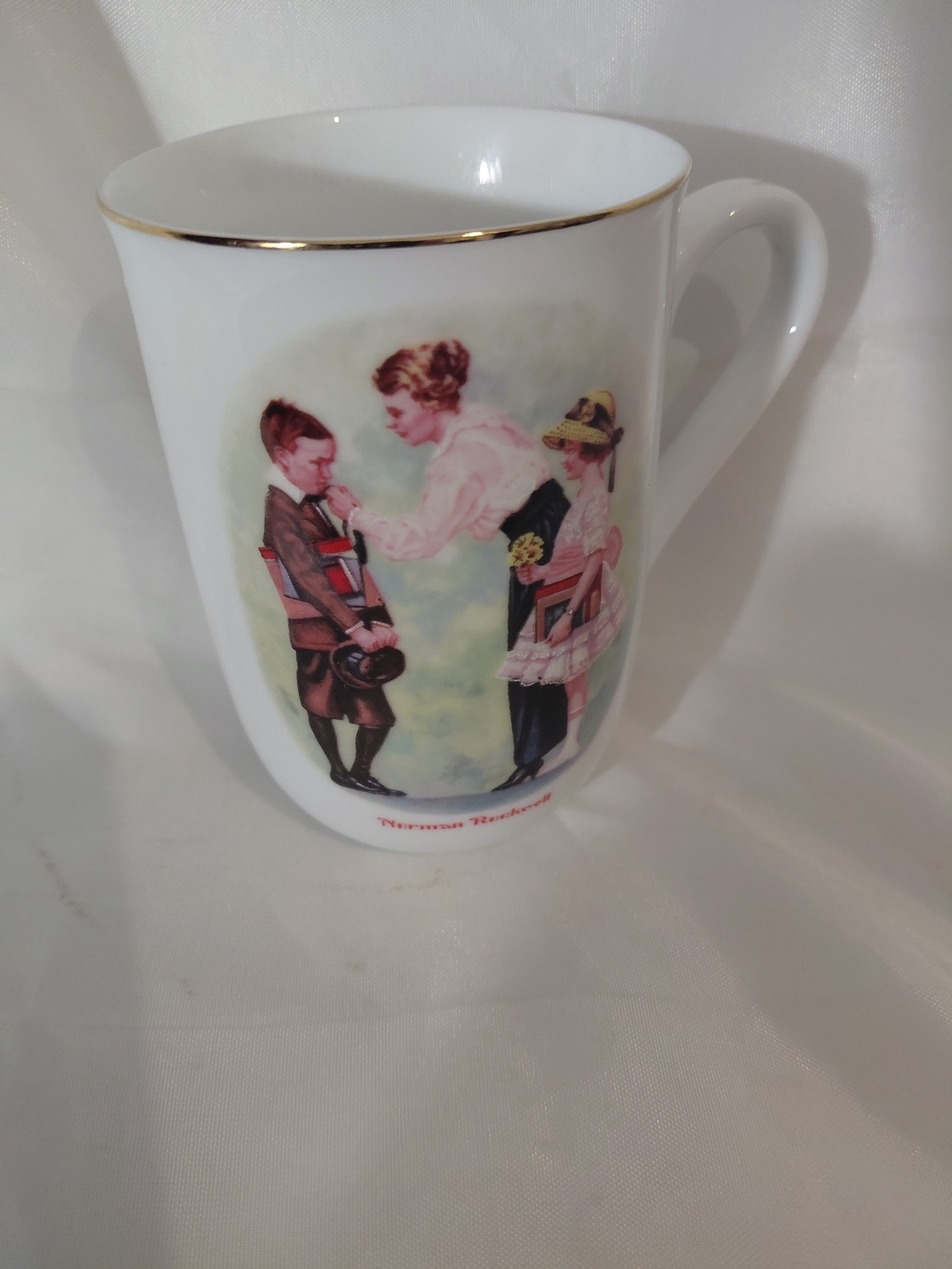 Norman Rockwell White Porcelain Mug with Gold Trim and Pastel Illustration